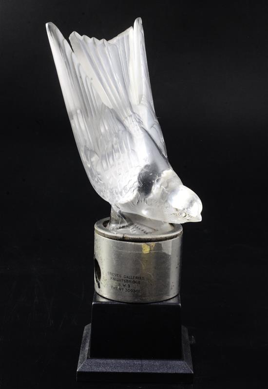 Hirondelle/Swallow. A glass mascot by René Lalique, introduced on 10/2/1928, No.1143 Height 18.3cm with mount, 23.3 overall.